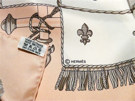 hermes gold ivory scarf tag|are Hermes scarves genuine.